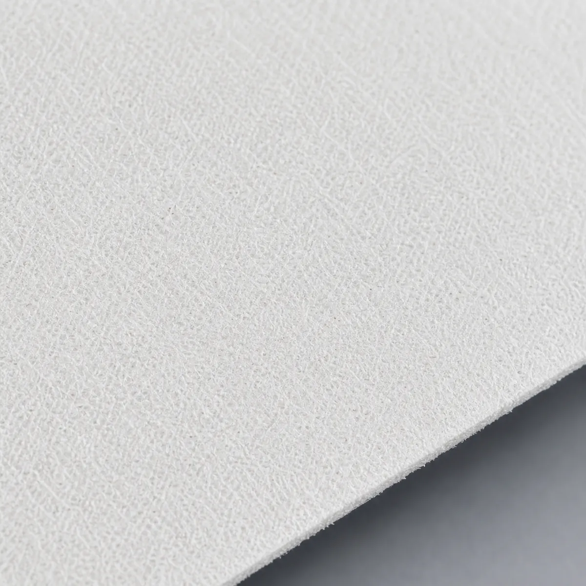 Close-up showing the surface texture of High-Hiding White Acoustic Facing.